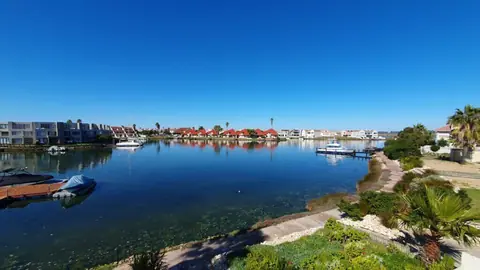 Blue-sky view across the Port Owen marina